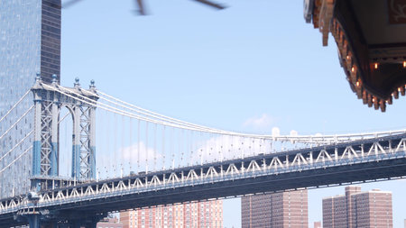New York City, United States - 30 Aug 2023: Manhattan Bridge to Brooklyn Dumbo. Retro vintage...