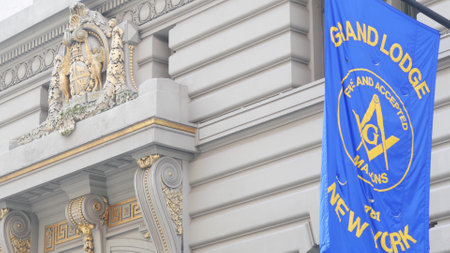 New York City, United States - 6 Sept 2023: Grand Lodge of Masons building facade, Manhattan street. Freemasons headquarters architecture. Masonry organization in NYC, USA. Masonic Hall exterior. Flagのeditorial素材
