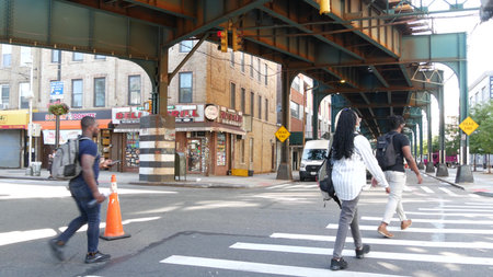 New York City, United States - 31 Aug 2023 Elevated subway above street. Metropolitan bridge over...