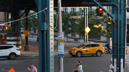 New York City, United States - 31 Aug 2023 Elevated subway above street. Metropolitan bridge over...