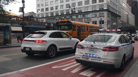 New York City, United States - 29 Aug 2023: Yellow School Bus on Manhattan 34 street, schoolbus and...