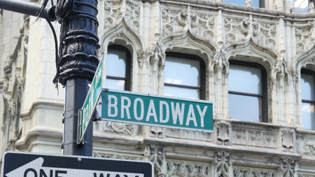 New York City Broadway street sign in Lower Manhattan, United States. Urban road sign in american...