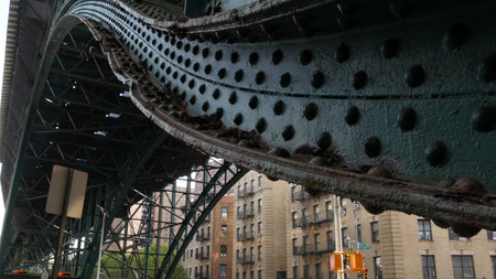 New York City 125 street elevated subway metro metallic bridge in Harlem, United States. American...