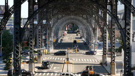 New York City, United States - 15 Sept 2024: Riverside drive viaduct, Harlem 125 street, Manhattan car traffic. 12 twelve avenue viaduct. Elevated flyover transport road. Steel arch bridge. Overpass.のeditorial素材