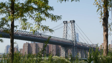 Williamsburg Bridge in Brooklyn, New York City, United States. Transport metallic bridge near Marcy...