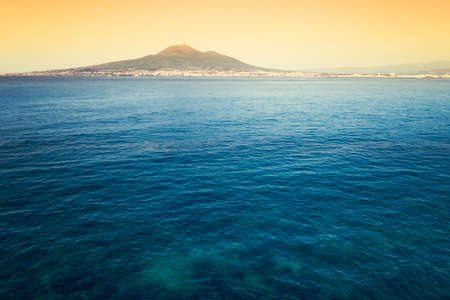 Castellammare di Stabia with the Gulf of Naples. Composition with multiple photographs of the Gulf of Naples and Mount Vesuvius with snow on topの写真素材