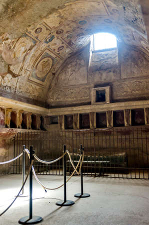 Pompeii is a ruined and partially buried Roman town-city near modern Naples in the Italian region of Campania, in the territory of the comune of Pompei. Along with Herculaneum, its sister city, Pompeii was destroyed, and completely buried, during a long cのeditorial素材