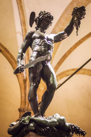 Perseus statue with the head of Medusa  in Loggia de' Lanzi Piazza della Signoria Florence. Sculptor Benvenuto Cellini 15451554.のeditorial素材