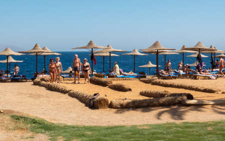 Sharm elSheikh Egypt  February 25 2013: Elderly tourists on the beach in Sharm elSheikh to play bowling on the beach. Seniors on vacation in the resorts of the Red Sea in Egypt in February.のeditorial素材