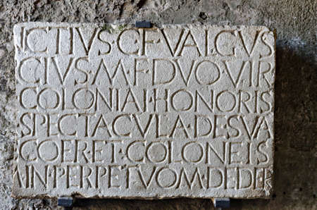 marble plaque at the entrance of Roman amphitheater in Pompeii where the Gladiators foughtのeditorial素材