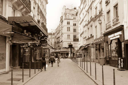 view on typical street among traditional parisian buildings in Paris Franceのeditorial素材