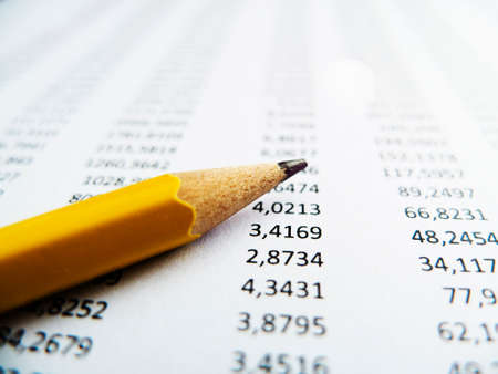 close up image of a financial worker analyzing statistical dataの写真素材