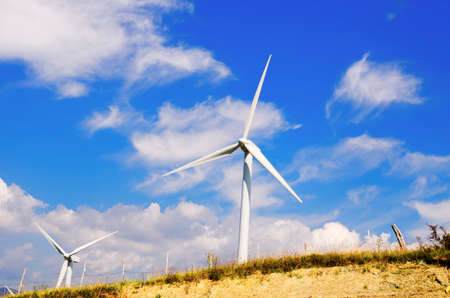 landscape with hills and wind turbines