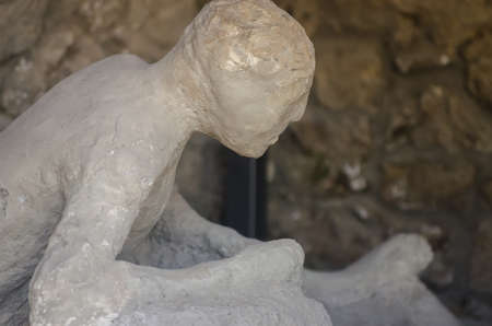 some plaster casts of victim of the eruption still in actual pompeii.the city is mainly famous for the ruins of the ancient city of pompeiiの写真素材