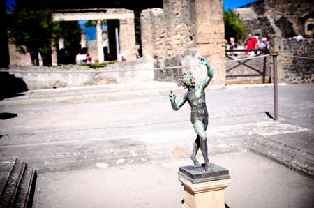 The House of the Faun, ancient Roman statue of the Dancing Faun. The ancient statue found in archaeological excavations gave the name to the house of Pompeii.の写真素材