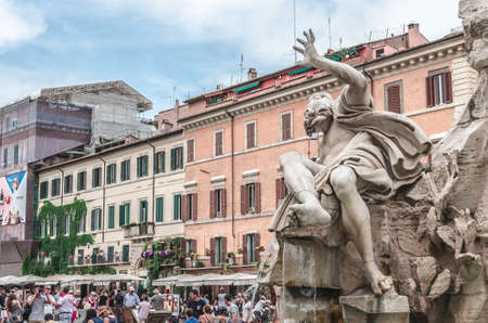 Rome, Italy - June 30, 2016: many tourists visiting the splendid statues of the famous fountains of Piazza Navona in Rome italyのeditorial素材