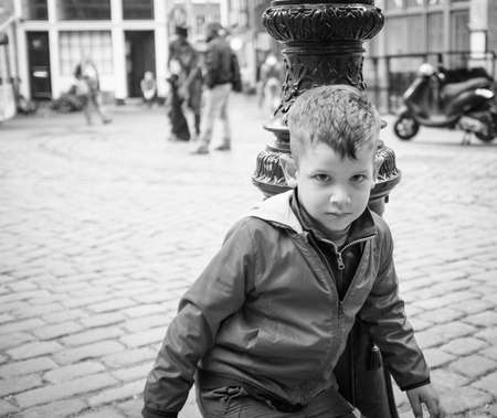 little boy portrait in the streetの写真素材