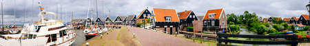 Volendam, Netherlands - June 30, 2016: Panorama of the port of Volendam on a cloudy spring day, Volendam is a village north of Amsterdam pencatoriのeditorial素材
