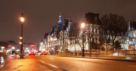 stunning night view from the bridge of Arcole in central Paris, Franceの写真素材