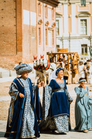 Asti, Italy - September 16, 2012: family of nobles in medieval costumes in historical parade on the day of the Palio in Asti, Italyのeditorial素材