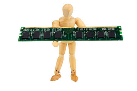 Wooden puppet carries a computer memory module isolated on a white backgroundの写真素材