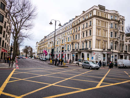 Automobile stopped at a stop sign in a central London road junctionのeditorial素材