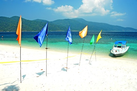 Boat on the beach at sunrise time の写真素材