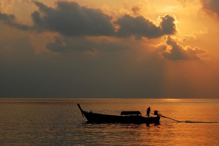 boat at sunset, Phuket, south of Thailand の写真素材