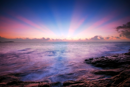 Sea sunset sunrise background nature beam sun sky cloudの写真素材