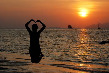 Jump on the Beach in Thailandの写真素材