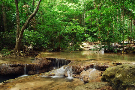 Waterfall with blue stream in the nature Thailand forestの写真素材