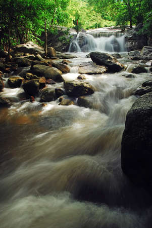 Waterfall with blue stream in the nature Thailand forestの写真素材