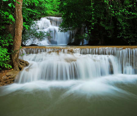 Waterfall with blue stream in the nature Thailand forestの写真素材