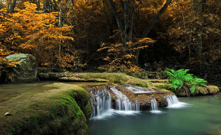 Waterfall with blue stream in the nature Thailand forest
