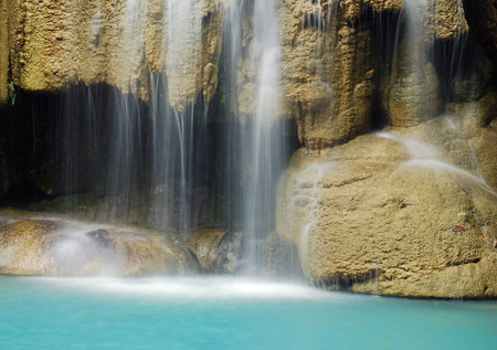 Waterfall with blue stream in the nature Thailand forestの写真素材