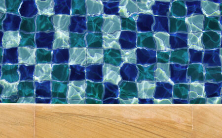 Swimming pool water background texture with space for text designの写真素材