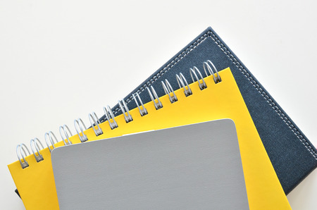 Books on the white table for background and text design