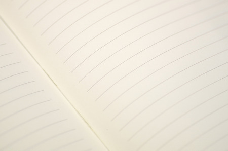 Pen and note book for background artwork designの写真素材