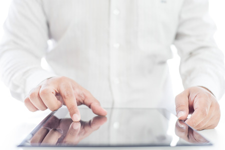 Businessman touching tablet for business concept