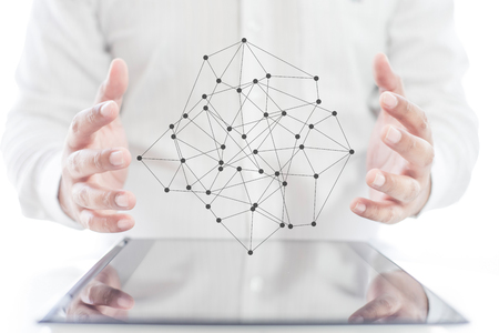 Businessman hands using tablet and mobile phone with social network diagram , communication network conceptの写真素材