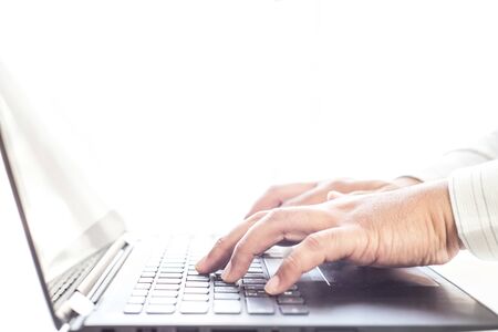 Businessman typing keyboard with labtop