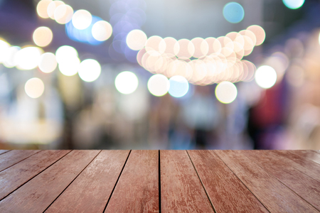 Wooden way with bokeh circle light background for background designの写真素材