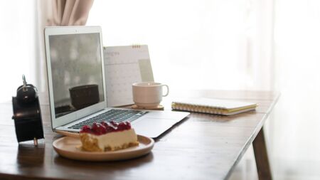 Home office desk with laptop computer