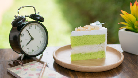 green tea green cake on wooden table for relaxation time