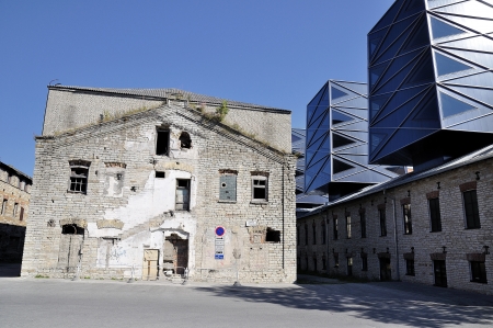 Modern building with old house in Tallinの写真素材
