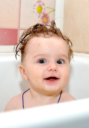 Portrait baby in bathroomの写真素材