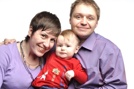 Mother with baby and father  in studioの写真素材