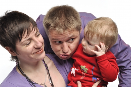 Mother with baby and tomfoolery fatherの写真素材