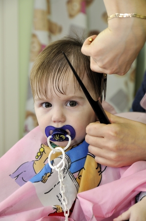 Hairstyle of the one-year-old child first timeの写真素材