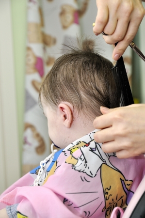 Hairstyle of the one-year-old child first timeの写真素材